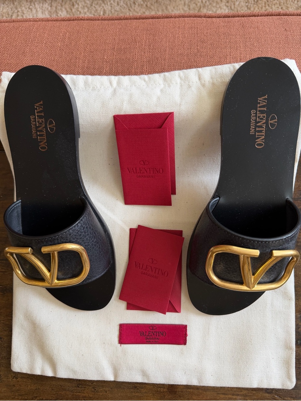Valentino Garavani Black Leather Slide Sandals with Gold V Logo